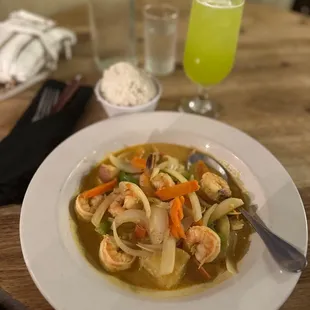 a plate of food and a drink