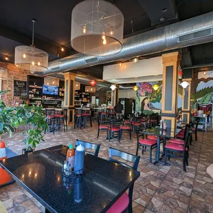 a man sitting at a table in a restaurant