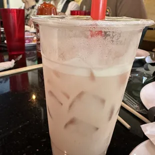 Rose Milk tea, half sugar.