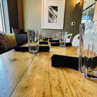 empty glasses on a wooden table