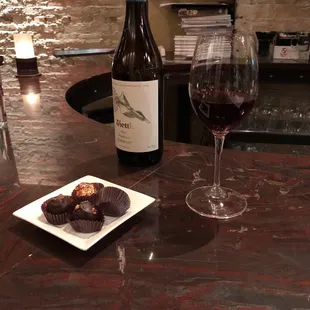 Bottle of nebbiolo plus truffles