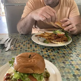 Piled high, oversized homemade buns - grilled or crisp chicken sandwiches