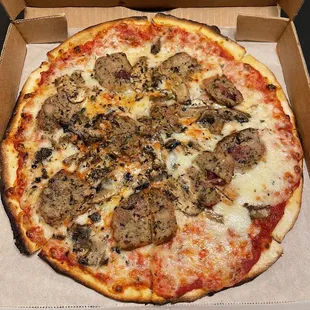 Small cheese pizza with brisket meatballs and mushrooms. Very good!!