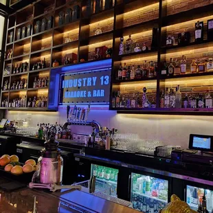 a bar with a variety of liquors