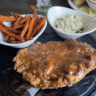 fried chicken with gravy and sweet potato fries