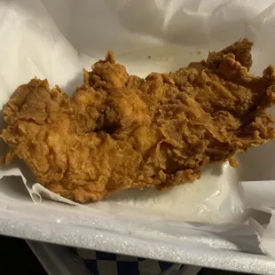 One single chicken tender-as big as my hand: $2.49
