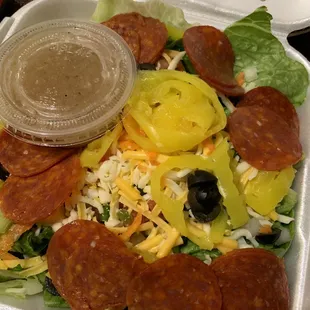Italian salad. Tons of pepperoni. This salad probably weighs two pounds.