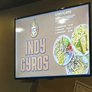 a menu displayed on a large screen