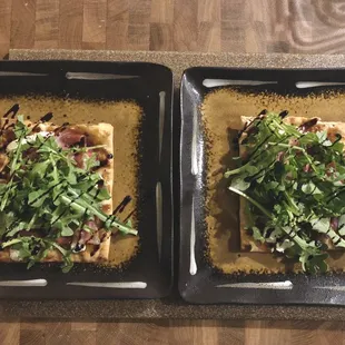 We made fig, prosciutto, goat cheese and arugula flatbread