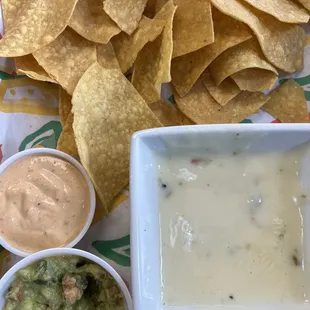 Queso and tortilla chips. Which also came with guacamole and a chipotle sauce.