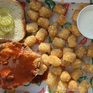 Nashville Hot Chicken sandwich with tater tots