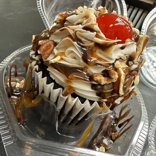 a cupcake with a cherry on top