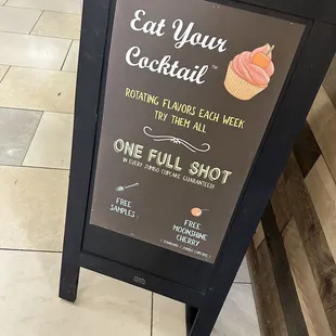 a sign for a cupcake shop