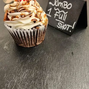 a cupcake with a cherry on top
