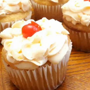 Jumbo boozy cupcake (for 2). A legit EDIBLE COCKTAIL™. Each has 1 full oz booze. Nobody else comes close! Free Moonshine cherry on top.