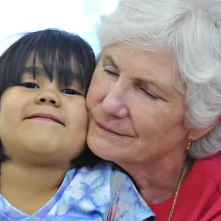 Brichta program coordinator Bonnie Demorotski with one of our Brichta kiddos.