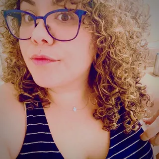Laura E.
