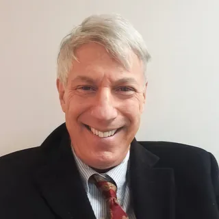 Dr. Andrew B.