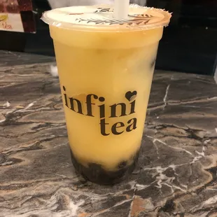 a cold drink in a plastic cup