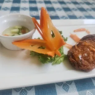 Thai Fish Cakes (5 to an order) w/ homemade Peanut-Cucumber dipping sauce...the sauce itself would be good on dirt clods. Cakes excellent