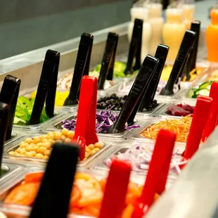 a variety of salads and condiments
