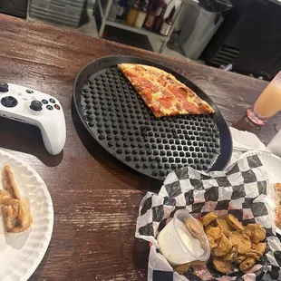 a pizza and chips on a table