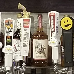 a row of beer taps