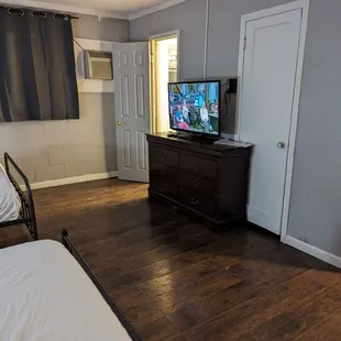 New marble top dresser and end table also new lamp. Bed frame, mattresses, linen, many upgrades