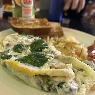 Egg white omelette with 4 ingredients and 1 meat (veggie option also)
