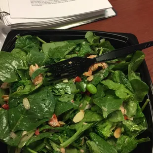 The SuperFoods Salad.  Spinach, edamame, asparagus, red onion, broccoli, tomatoes, almond slices, and salmon.  Sooo good.