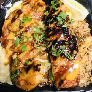 Salmon and tiger shrimp over hibachi rice and Mac n cheese