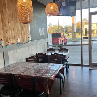 a table and chairs in a restaurant