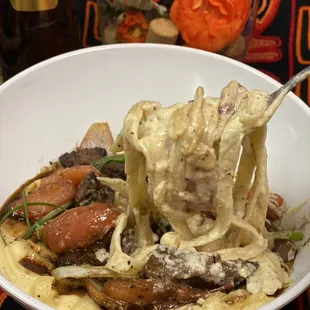 Fettuccine Alfredo with Huancaina sauce and  Lomo al Jugo