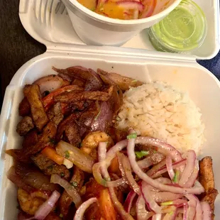 Holy Moly THIS IS THE BOMBBBB! Lomo Especial with Salsa Criolla and Aji Pieza green sauce  WOW!!