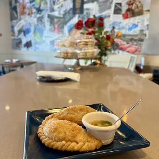Empanadas $12.70A portion of two with a choice of: Beef or Chicken or spinach with cheese. 3/5 okay because they were a little bitter.
