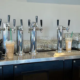 The newly built bar area with taps waiting to be hooked up was surrounded by Starbucks drinks from the servers. 1/5 not sanitary
