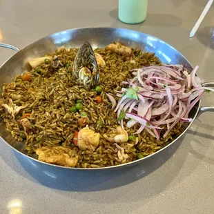Arroz con Mariscos ...... $28.95 Peruvian Paella is a 2/5 good because the rice was dry and partially cooked.