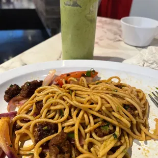 Tallarin with impossible meat. Green sauce is the bomb!