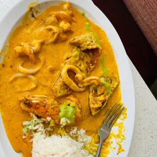 a plate of food and a fork