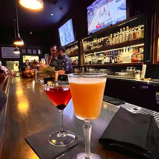 two cocktails on the bar