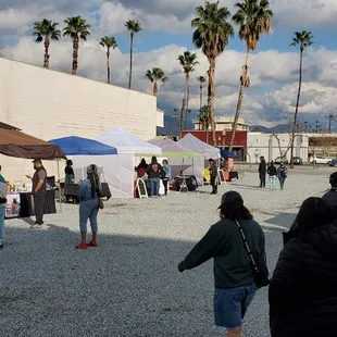 a crowd of people walking around