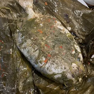 E10. Kachin Whole Fish Wrapped In Banana Leaf