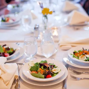 a table set for a formal dinner