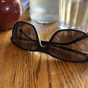 a pair of glasses on a table