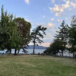 a view of the water and trees