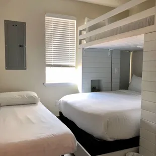 two beds in a small room