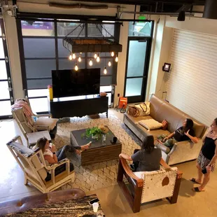 a group of people in a living room