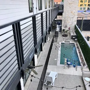 a view of the pool from the balcony