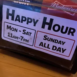 a happy hour sign