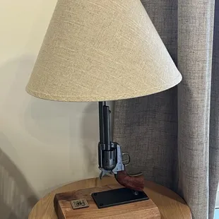 Gun lamp on the side table